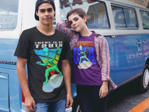 couple wearing different round neck tees mockup against a blue van a16443 e1743986356446